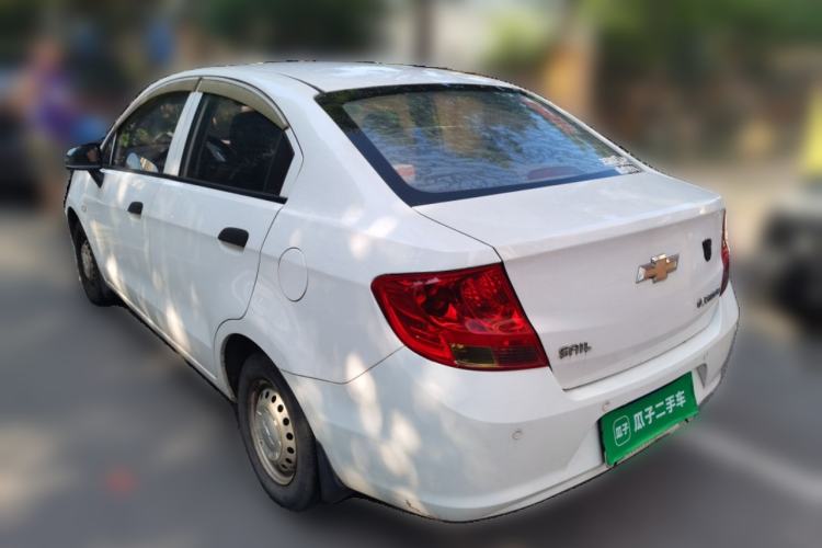 Used Chevrolet Sail 2013 Sedan 1.2L Manual Fashionable Happiness Edition Rear Left 45 Deg