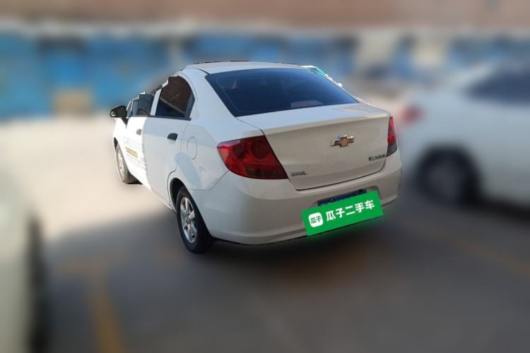 Used Chevrolet Sail 2013 Sedan 1.2L Manual Fashionable Happiness Edition Rear Left 45 Deg