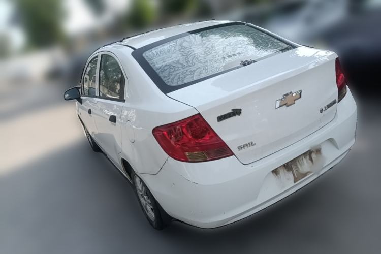 Used Chevrolet Sail 2013 Sedan 1.4L Manual Ideal Happiness Edition Rear Left 45 Deg