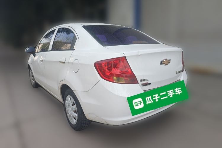Used Chevrolet Sail 2013 Sedan 1.4L Manual Ideal Happiness Edition Rear Left 45 Deg