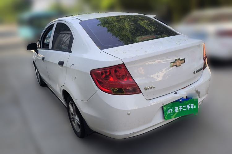 Used Chevrolet Sail 2013 Sedan 1.4L Manual Ideal Happiness Edition Rear Left 45 Deg