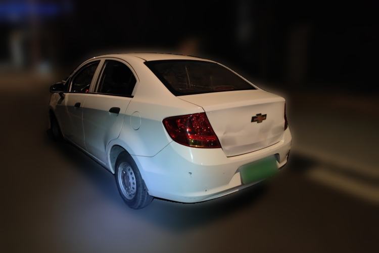Used Chevrolet Sail 2013 Sedan 1.2L Manual Fashionable Happiness Edition Rear Left 45 Deg