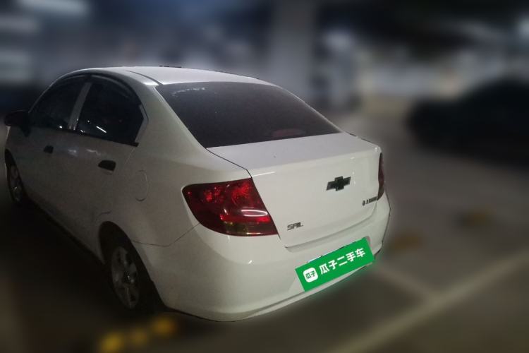 Used Chevrolet Sail 2013 Sedan 1.2L Manual Fashionable Happiness Edition Rear Left 45 Deg