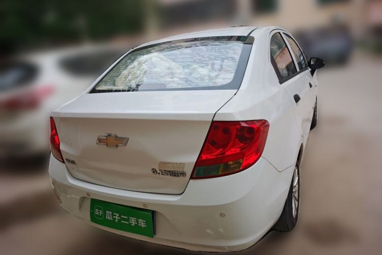 Used Chevrolet Sail 2013 Sedan 1.2L Manual Fashionable Happiness Edition Rear