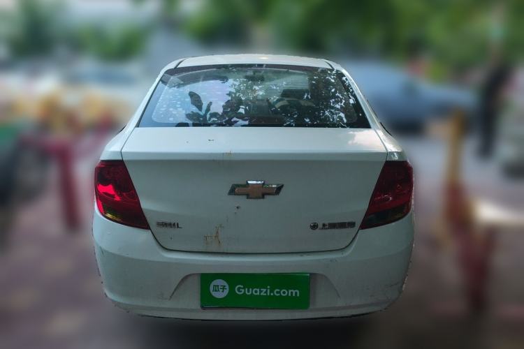 Used Chevrolet Sail 2013 Sedan 1.4L Manual Ideal Happiness Edition Rear