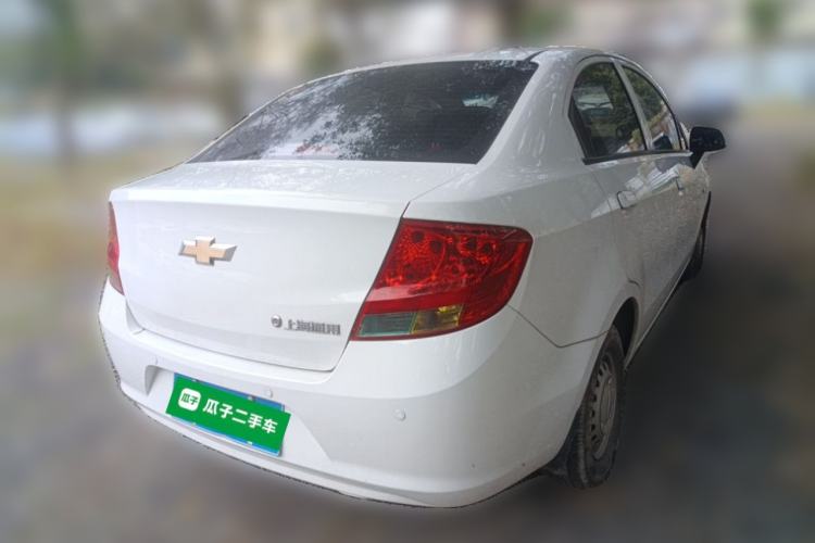 Used Chevrolet Sail 2013 Sedan 1.2L Manual Fashionable Happiness Edition Rear Right 45 Deg