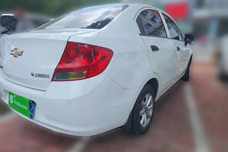 Used Chevrolet Sail 2013 Sedan 1.2L Manual Fashionable Happiness Edition Rear Right 45 Deg
