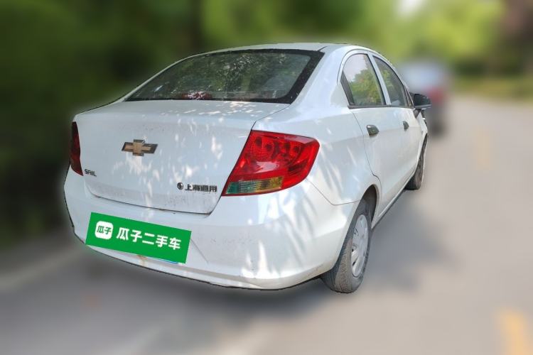Used Chevrolet Sail 2013 Sedan 1.2L Manual Fashionable Happiness Edition Rear Right 45 Deg