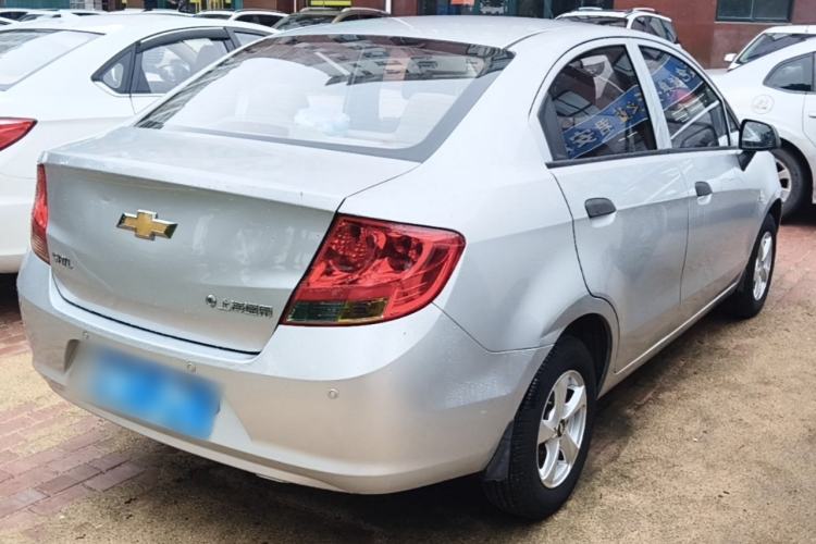 Used Chevrolet Sail 2013 Sedan 1.2L Manual Fashionable Happiness Edition Rear Right 45 Deg