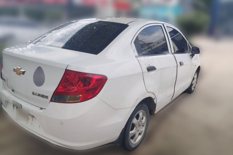 Used Chevrolet Sail 2013 Sedan 1.4L Manual Happiness Edition II Rear Right 45 Deg