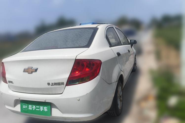 Used Chevrolet Sail 2013 Sedan 1.2L Manual Fashionable Happiness Edition Rear Right 45 Deg