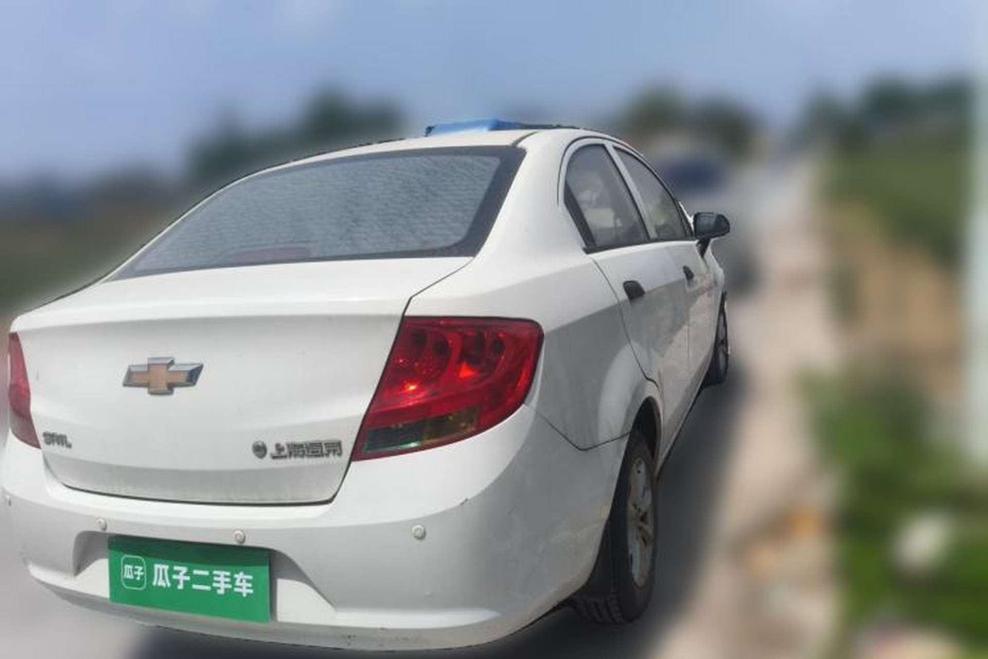 Used Chevrolet Sail 2013 Sedan 1.2L Manual Fashionable Happiness Edition Rear Right 45 Deg