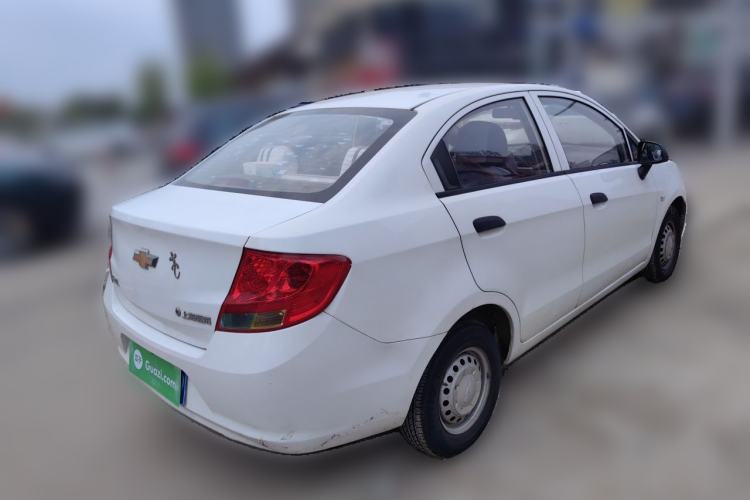 Used Chevrolet Sail 2013 Sedan 1.2L Manual Fashionable Happiness Edition Rear Right 45 Deg