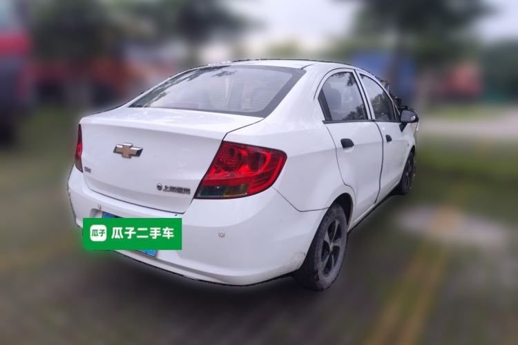 Used Chevrolet Sail 2013 Sedan 1.2L Manual Fashionable Happiness Edition Rear Right 45 Deg