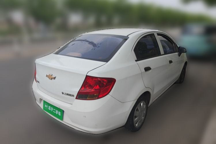 Used Chevrolet Sail 2013 Sedan 1.4L Manual Ideal Happiness Edition Rear Right 45 Deg