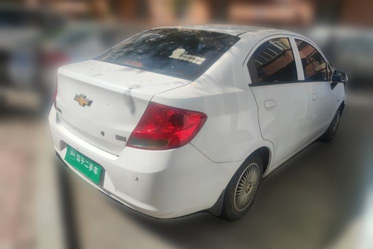 Used Chevrolet Sail 2013 Sedan 1.4L Manual Ideal Happiness Edition Rear Right 45 Deg