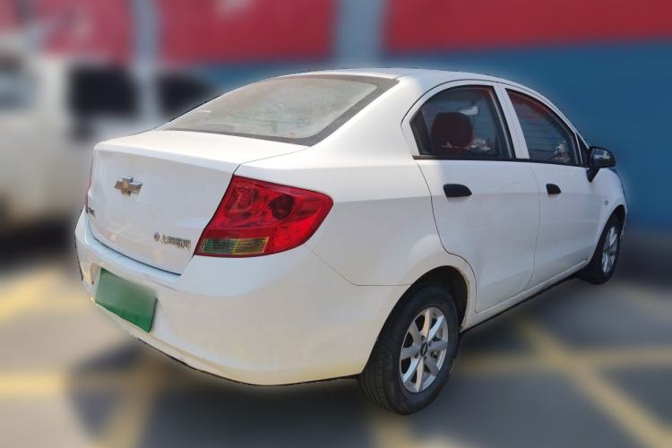 Used Chevrolet Sail 2013 Sedan 1.2L Manual Fashionable Happiness Edition Rear Right 45 Deg