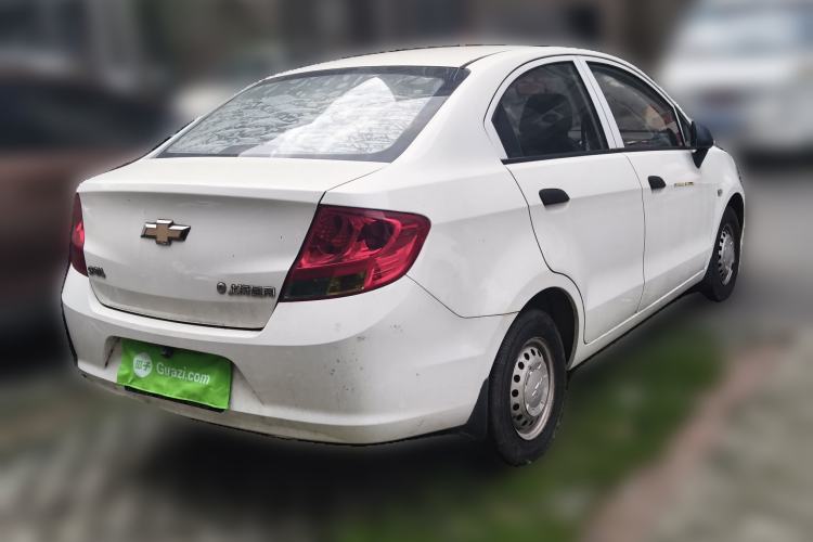 Used Chevrolet Sail 2013 Sedan 1.2L Manual Fashionable Happiness Edition Rear Right 45 Deg
