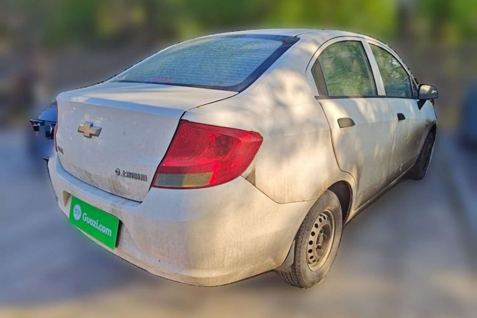 Used Chevrolet Sail 2013 Sedan 1.2L Manual Fashionable Happiness Edition Rear Right 45 Deg