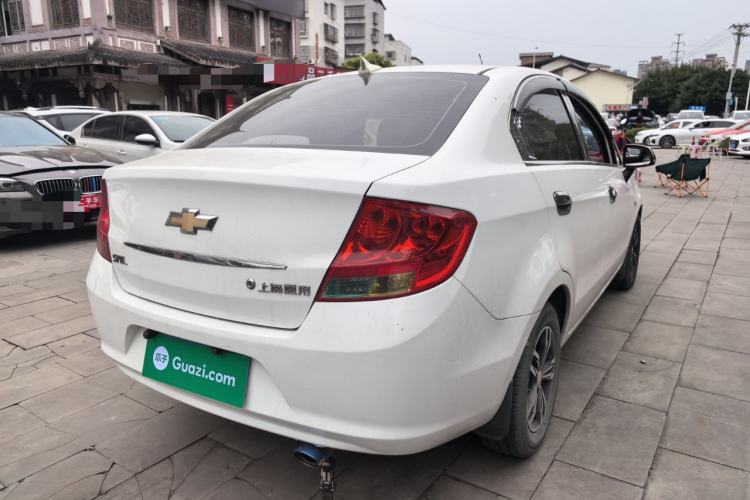 Used Chevrolet Sail 2013 Sedan 1.2L Manual Fashionable Happiness Edition Rear Right 45 Deg