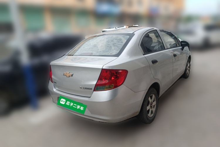 Used Chevrolet Sail 2013 Sedan 1.2L Manual Warm Edition Rear Right 45 Deg