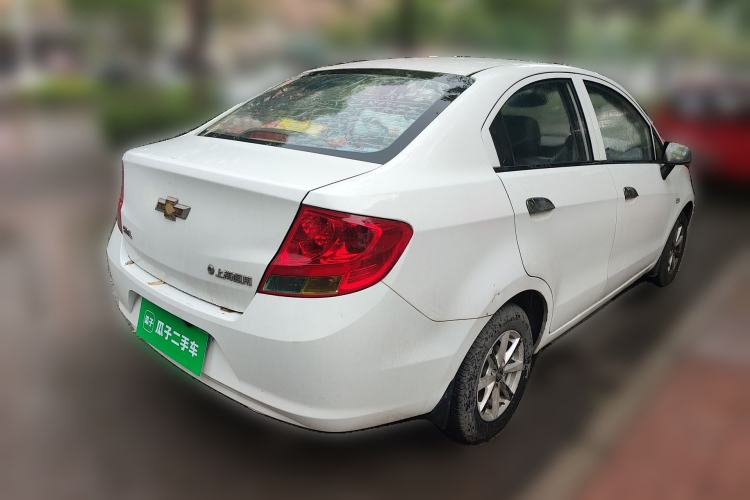 Used Chevrolet Sail 2013 Sedan 1.2L Manual Happiness Edition Rear Right 45 Deg