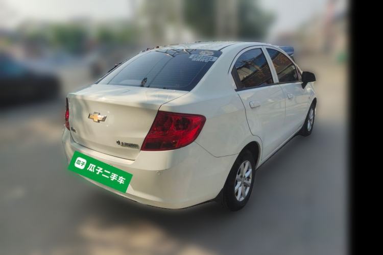 Used Chevrolet Sail 2013 Sedan 1.2L Manual Warm Edition Rear Right 45 Deg