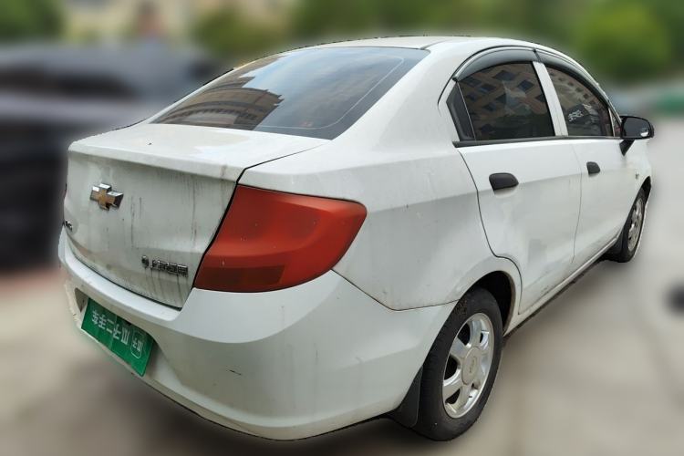 Used Chevrolet Sail 2013 Sedan 1.4L Manual Ideal Happiness Edition Rear Right 45 Deg