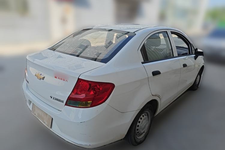 Used Chevrolet Sail 2013 Sedan 1.2L Manual Fashionable Happiness Edition Rear Right 45 Deg