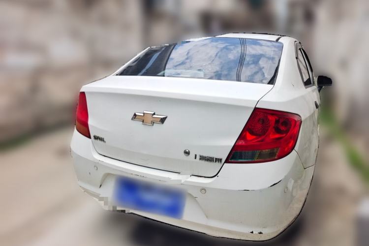 Used Chevrolet Sail 2013 Sedan 1.2L AMT Ideal Edition Rear Right 45 Deg
