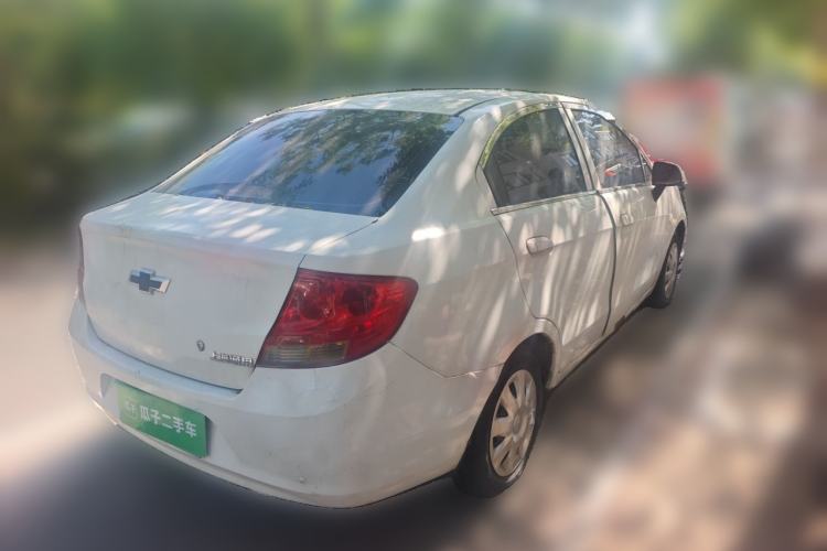 Used Chevrolet Sail 2013 Sedan 1.4L Manual Ideal Happiness Edition Rear Right 45 Deg