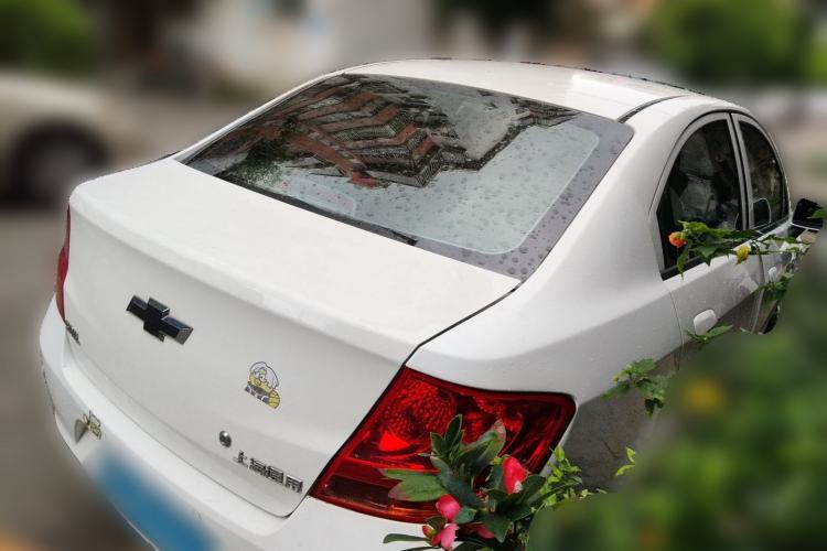 Used Chevrolet Sail 2013 Sedan 1.4L AMT Enjoy Edition Rear Right 45 Deg