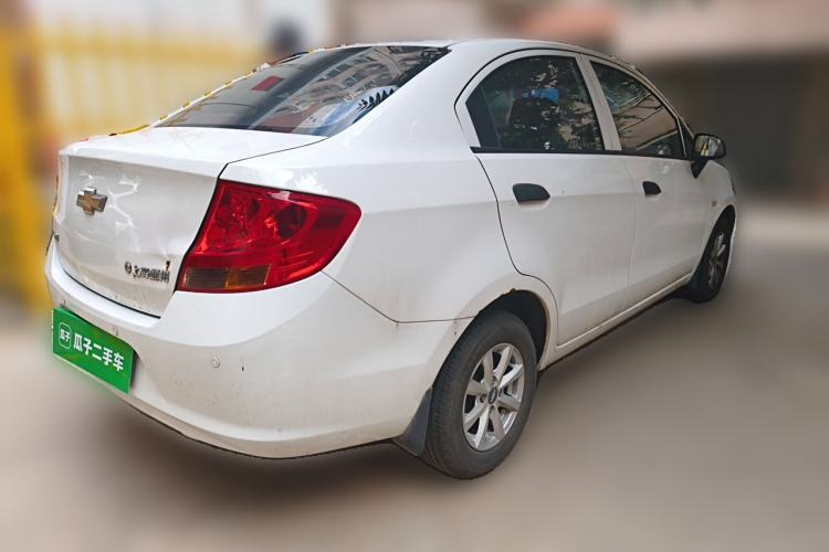 Used Chevrolet Sail 2013 Sedan 1.2L Manual Fashionable Happiness Edition Rear Right 45 Deg