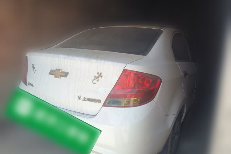 Used Chevrolet Sail 2013 Sedan 1.2L Manual Fashionable Happiness Edition Rear Right 45 Deg