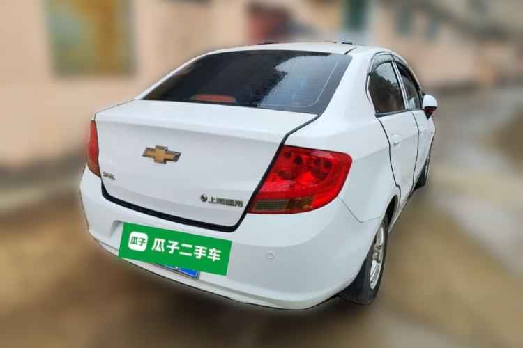 Used Chevrolet Sail 2013 Sedan 1.4L Manual Happiness Edition II Rear Right 45 Deg