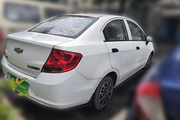 Used Chevrolet Sail 2013 Sedan 1.2L Manual Warm Edition Rear Right 45 Deg