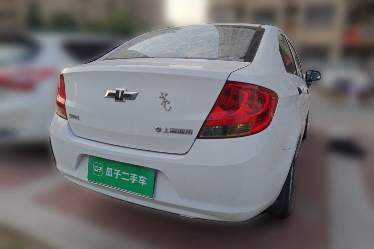 Used Chevrolet Sail 2013 Sedan 1.2L Manual Fashionable Happiness Edition Rear Right 45 Deg
