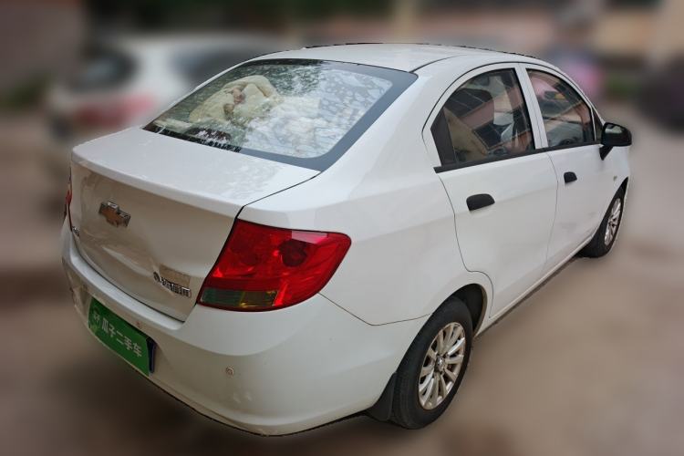 Used Chevrolet Sail 2013 Sedan 1.2L Manual Fashionable Happiness Edition Rear Right 45 Deg