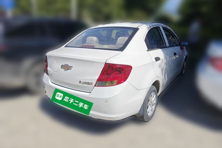 Used Chevrolet Sail 2013 Sedan 1.2L Manual Fashionable Happiness Edition Rear Right 45 Deg
