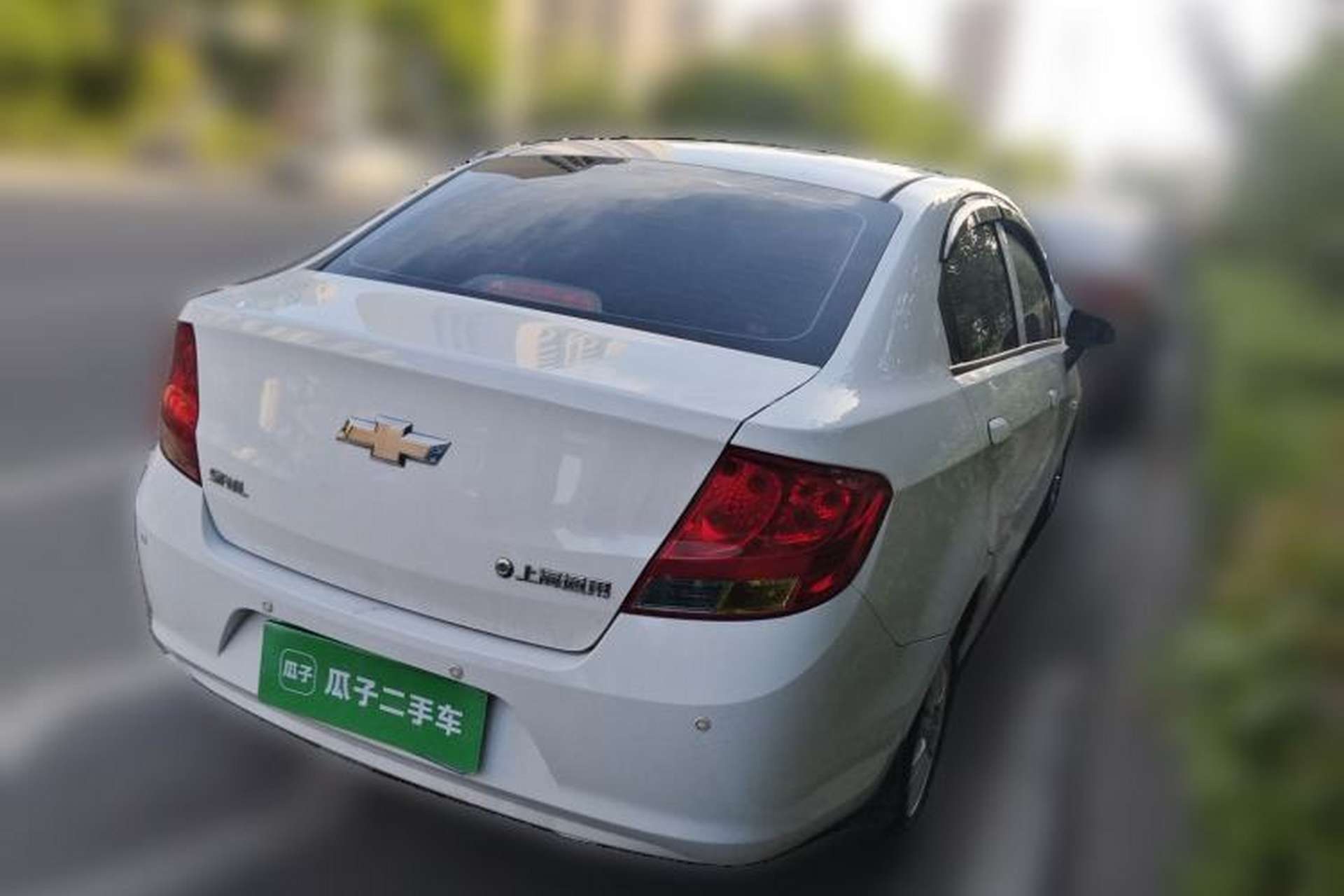 Used Chevrolet Sail 2013 Sedan 1.4L Manual Ideal Happiness Edition Rear Right 45 Deg