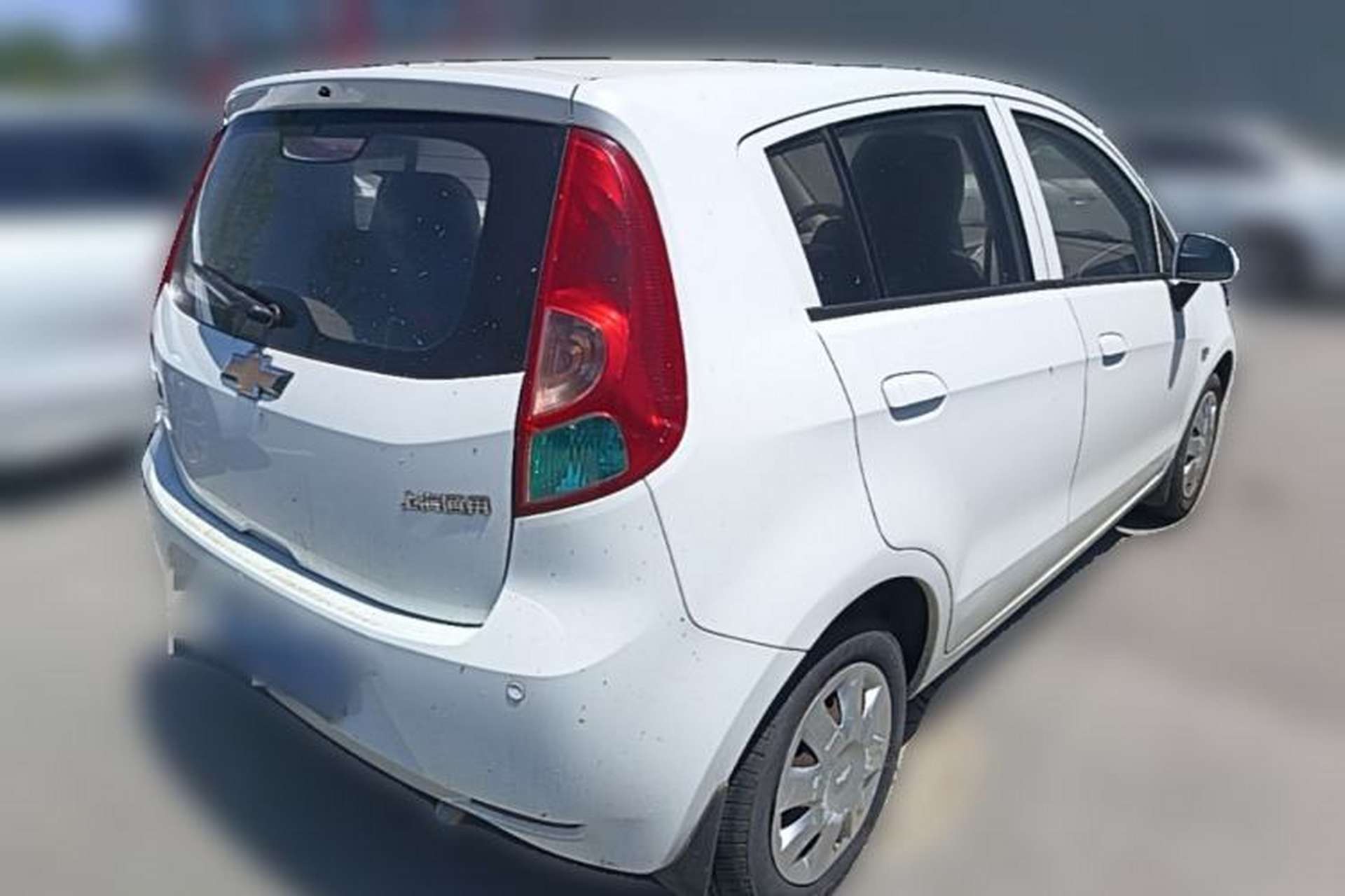 Used Chevrolet Sail 2013 Hatchback 1.4L Manual Enjoyment Edition Rear Right 45 Deg
