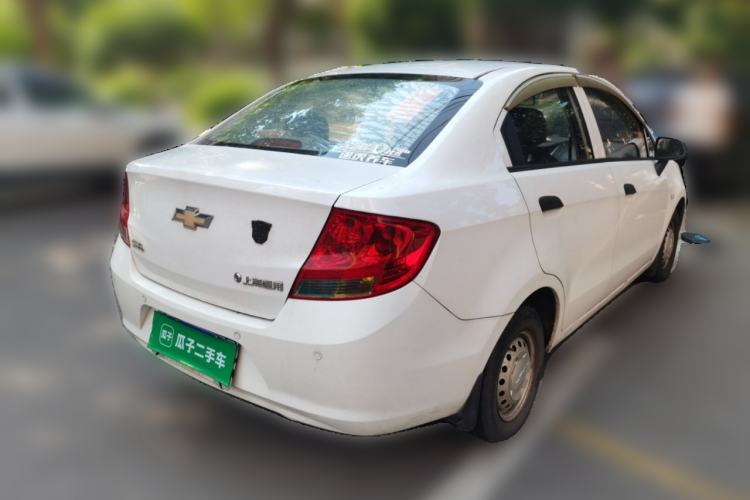 Used Chevrolet Sail 2013 Sedan 1.2L Manual Fashionable Happiness Edition Rear Right 45 Deg