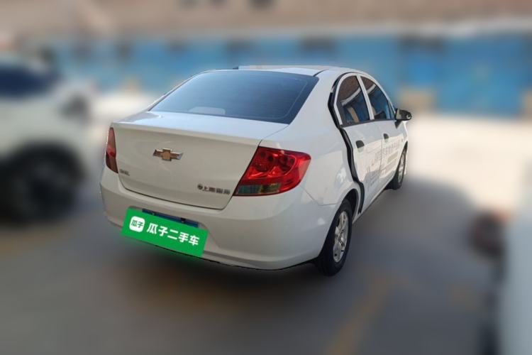 Used Chevrolet Sail 2013 Sedan 1.2L Manual Fashionable Happiness Edition Rear Right 45 Deg