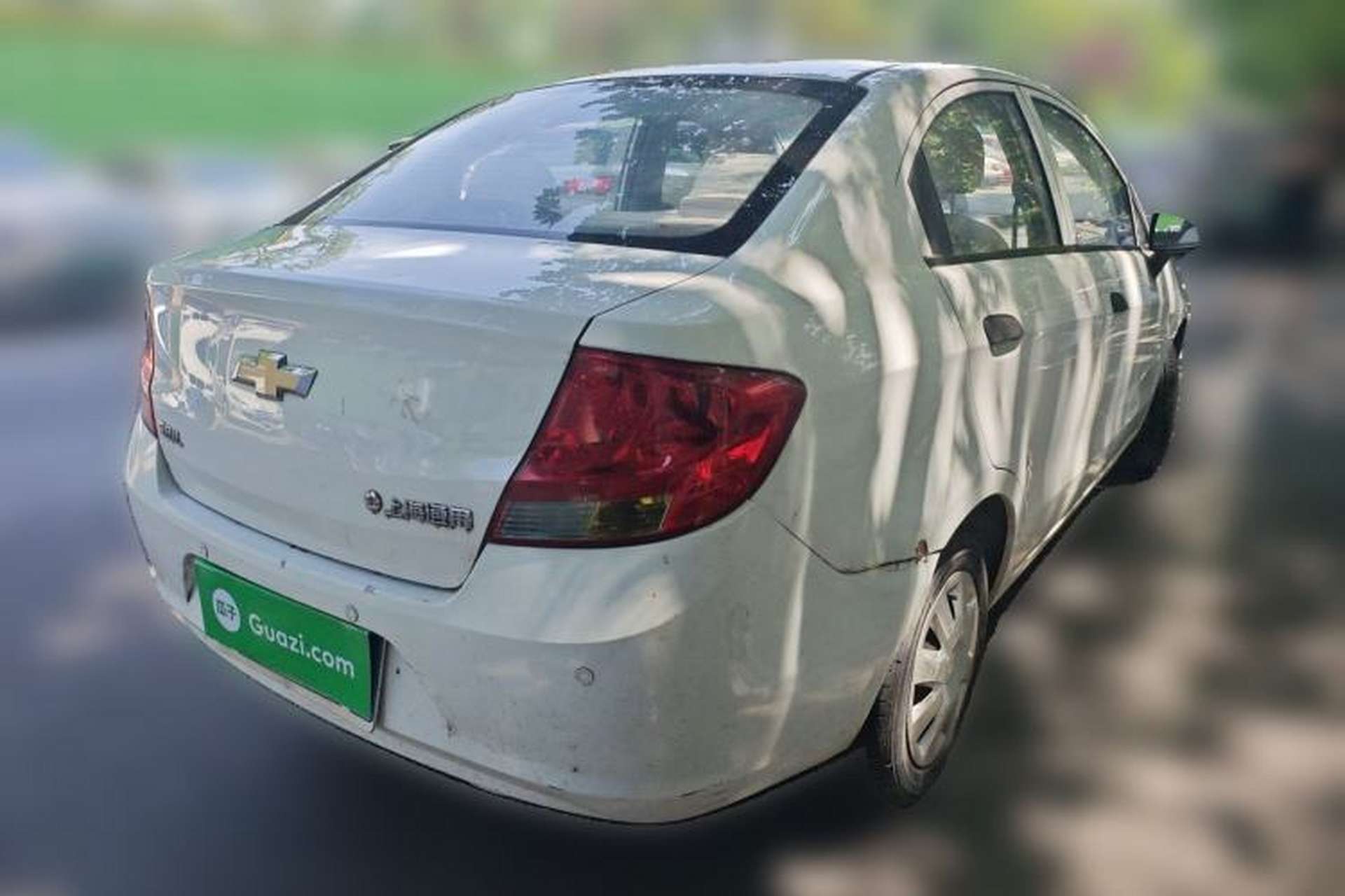 Used Chevrolet Sail 2013 Sedan 1.4L Manual Ideal Happiness Edition Rear Right 45 Deg