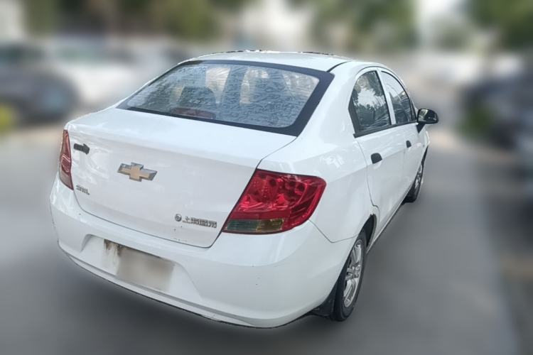 Used Chevrolet Sail 2013 Sedan 1.4L Manual Ideal Happiness Edition Rear Right 45 Deg