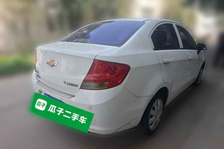 Used Chevrolet Sail 2013 Sedan 1.4L Manual Ideal Happiness Edition Rear Right 45 Deg