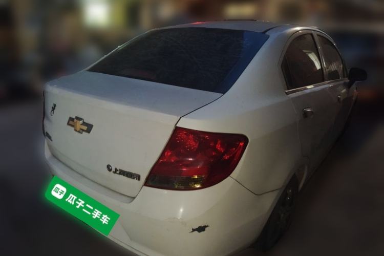 Used Chevrolet Sail 2013 Sedan 1.4L Manual Ideal Happiness Edition Rear Right 45 Deg