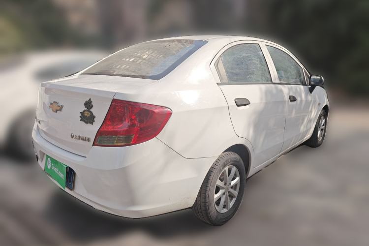 Used Chevrolet Sail 2013 Sedan 1.2L Manual Fashionable Happiness Edition Rear Right 45 Deg