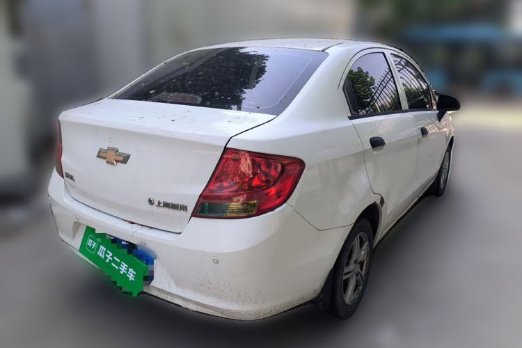 Used Chevrolet Sail 2013 Sedan 1.4L Manual Ideal Happiness Edition Rear Right 45 Deg
