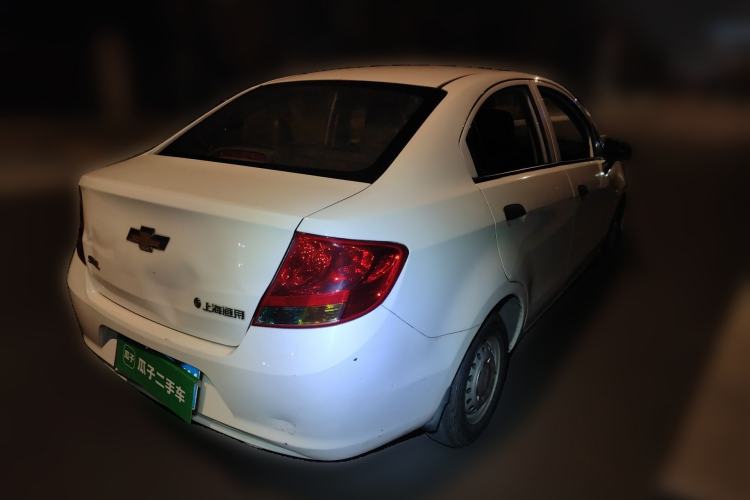 Used Chevrolet Sail 2013 Sedan 1.2L Manual Fashionable Happiness Edition Rear Right 45 Deg